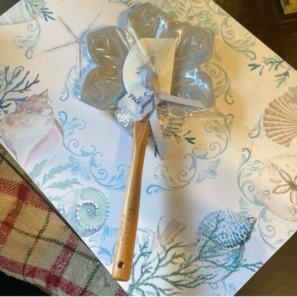 Frozen iridescent blue spatula and dish